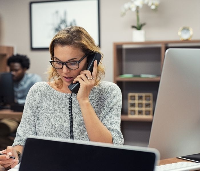 Woman answering leads